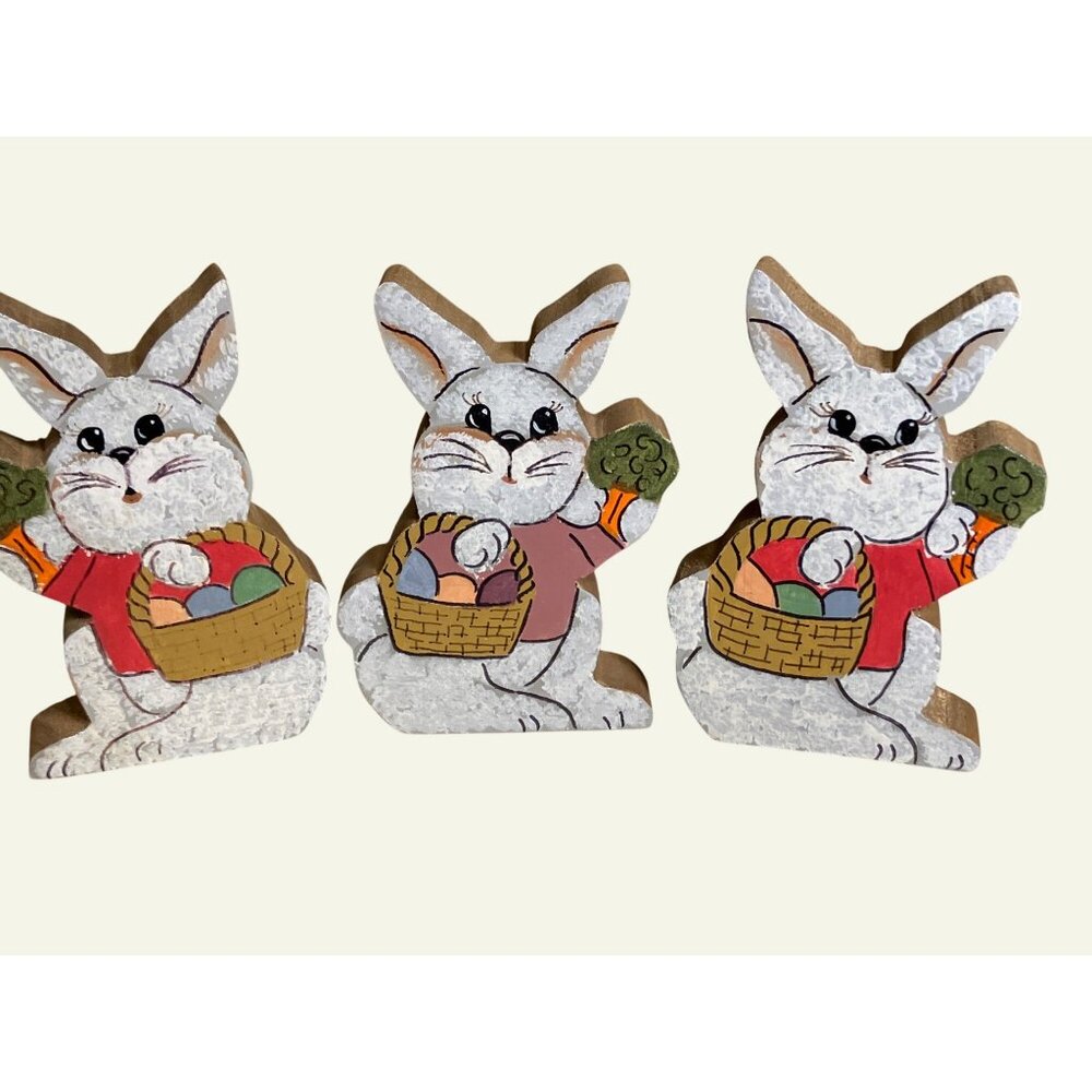 Handcrafted Wooden Easter Bunny Figures With Painted Details and Basket Design